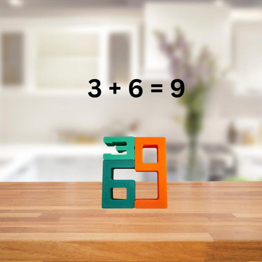 Stack & Add Number Blocks: green 3 on a dark green 6, as tall as an orange 9, showing 3 + 6 = 9
