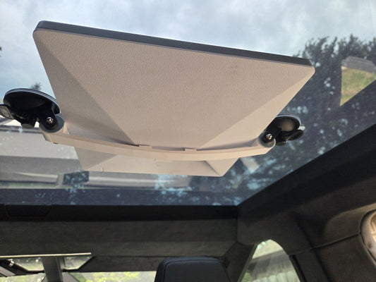 White suction cup mount holding a Starlink Mini dish on a car sunroof, seen from inside. Compatible with Starlink Mini